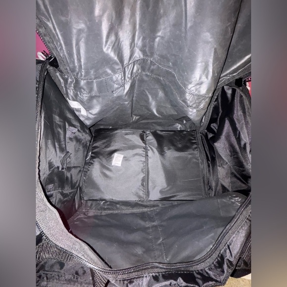 Black Duffel Bag with White Accents and Modern Design - Picture 12 of 13